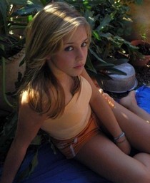 Cute young teen peels her